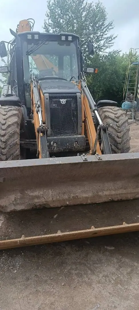 CASE 695* Экскаватор-погрузчик