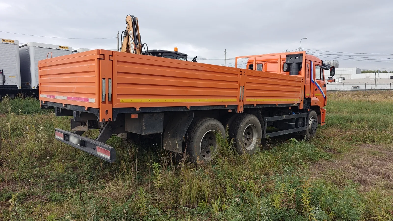 КАМАЗ 65115 6x4 Самосвал, фото 3
