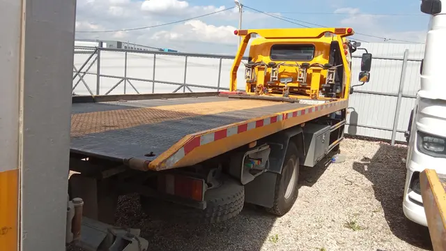 ISUZU ELF 12 (NQR) 4x2 Эвакуатор, фото 3