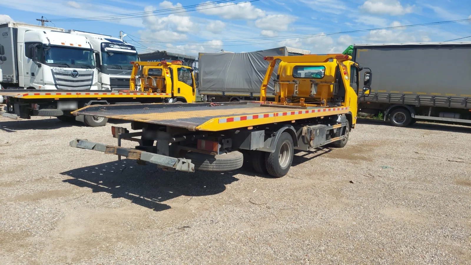 ISUZU ELF 12 (NQR) 4x2 Эвакуатор, фото 3